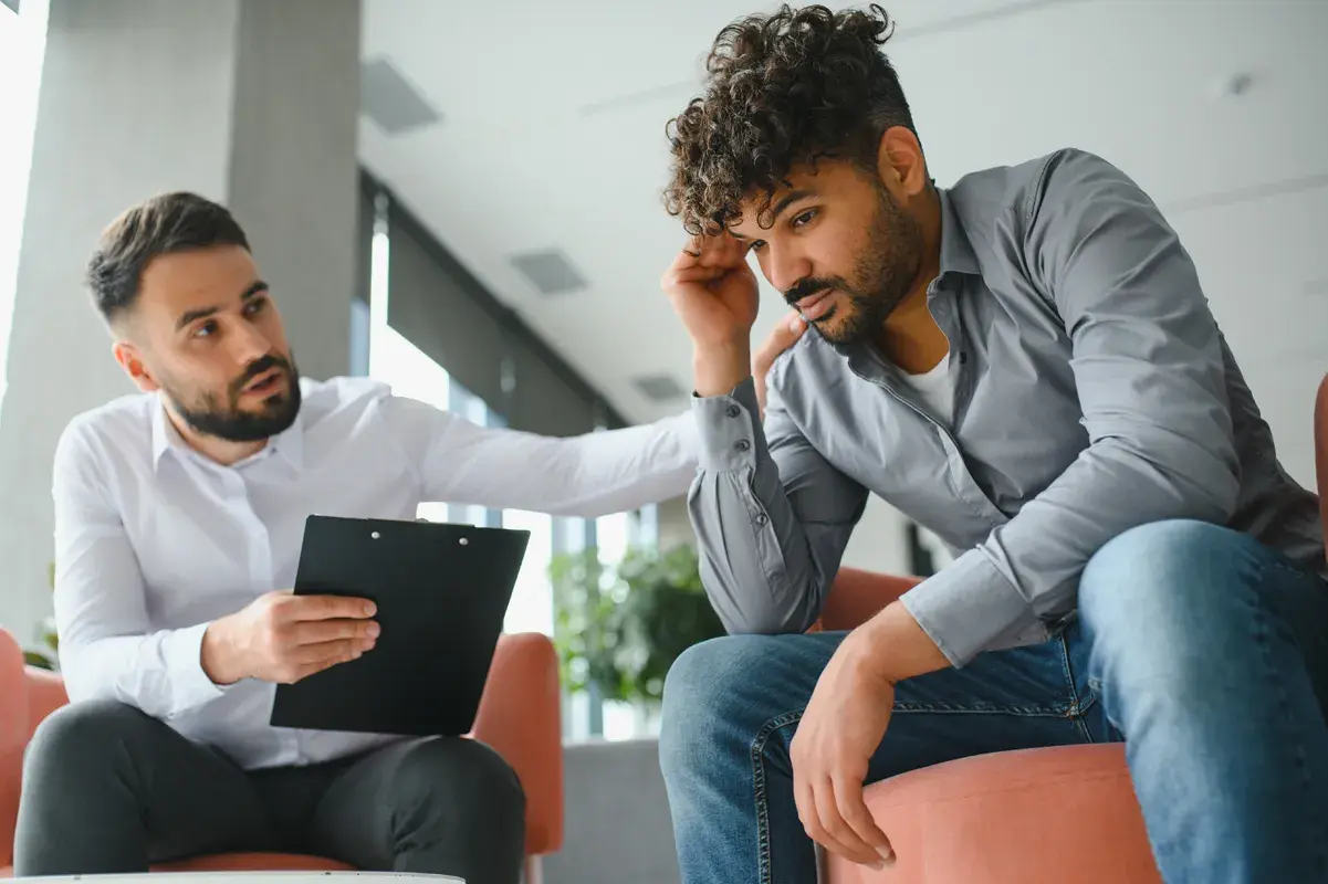 Psychologist counselling high cortisol level man