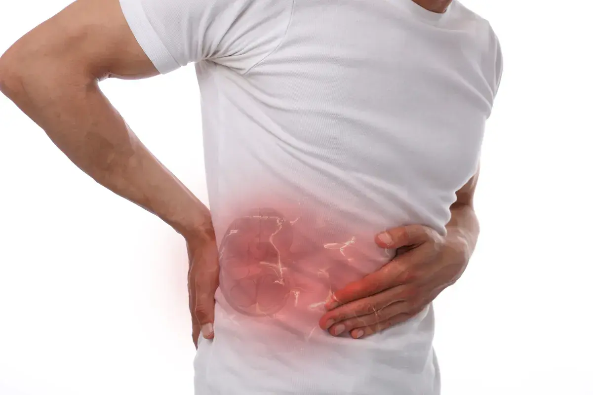 Man holding his side with highlighted painful kidney area