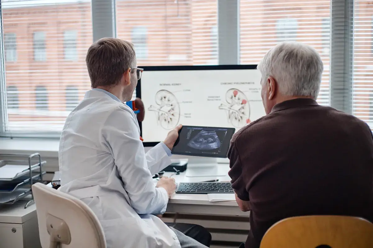 Kidney specialist explaining tests to patient